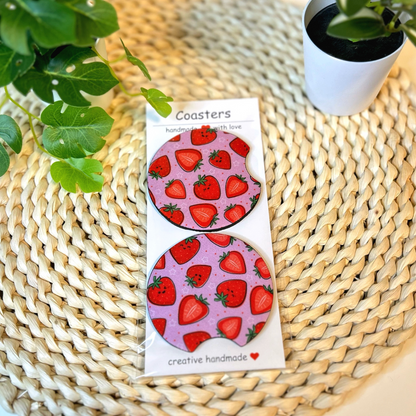 Duo de sous-verres pour voiture avec motif de fraises rouges sur fond rose pastel