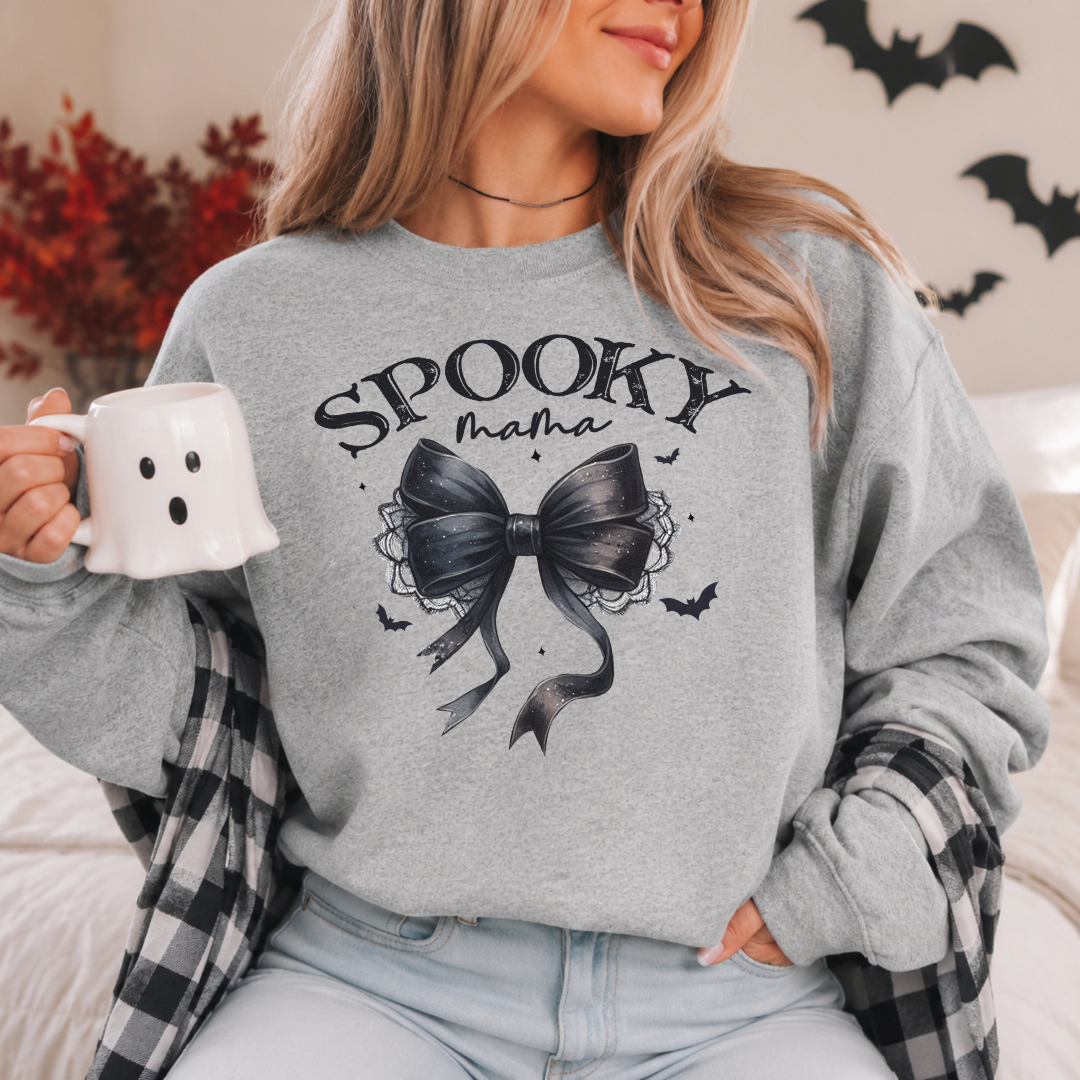 sweatshirt unisexe avec l'inscription Spooky Mama et boucle coquette noir pour la saison d'Halloween et l'automne.