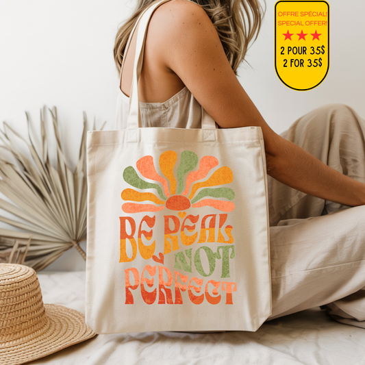 Tote bag beige en coton avec inscription rétro colorée Be Real Not Perfect.